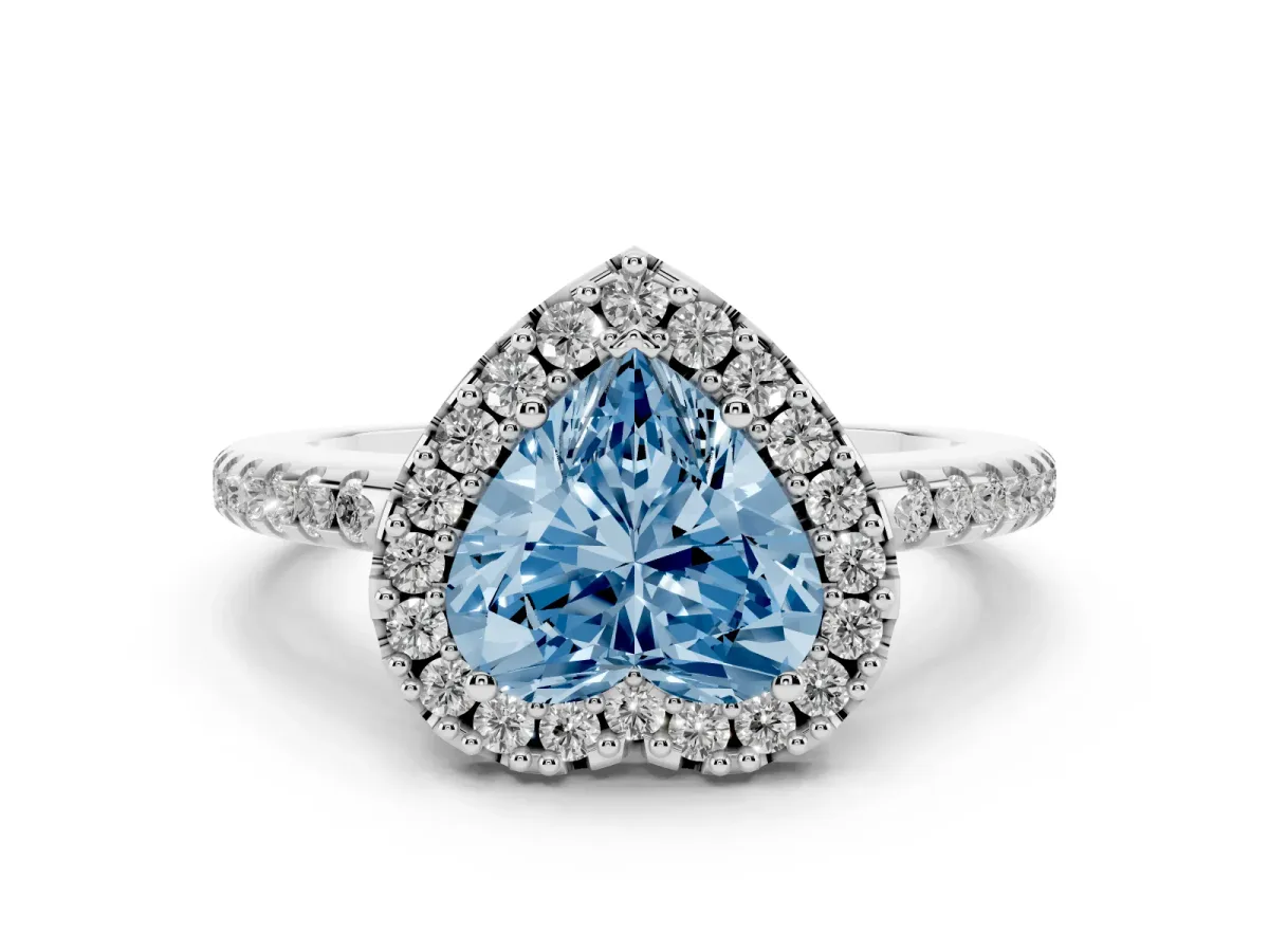 Fancy Blue Heart Cut Diamond Pavé Halo Ring Set in White gold with Prong Setting