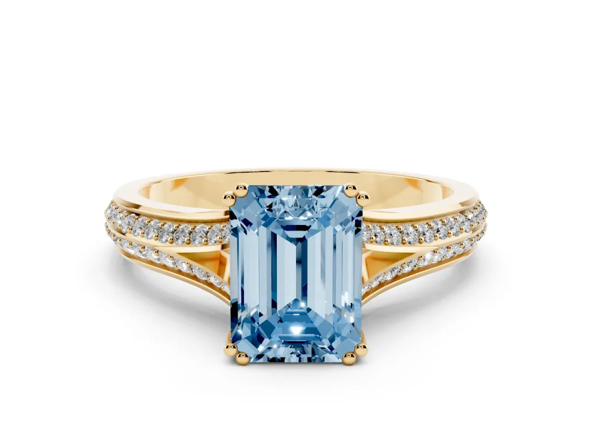 Fancy Blue Emerald Cut Diamond Split Shank Pavé Engagement Ring Set in Yellow gold with Prong-Set Center Stone