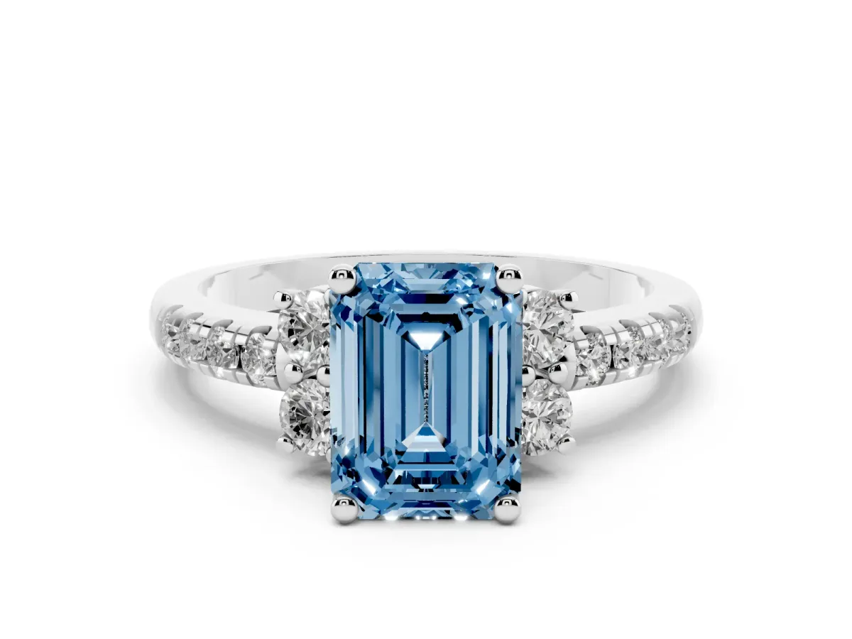 Fancy Blue Emerald Cut Diamond Three-Stone Pavé Ring Set in Silver with Prong Setting