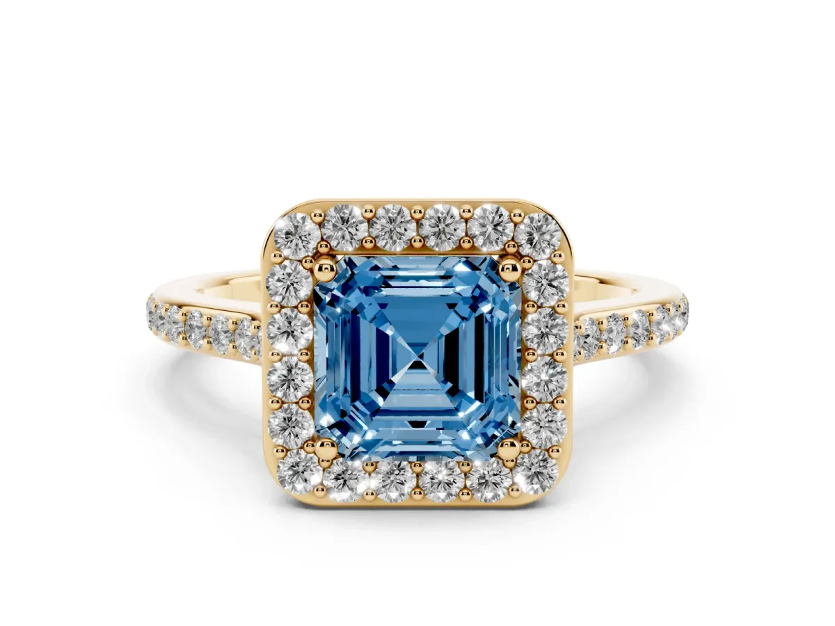 Fancy Blue Asscher Cut Diamond Halo Engagement Ring Set in Yellow gold with Round Pavé Shoulders and Heart Gallery