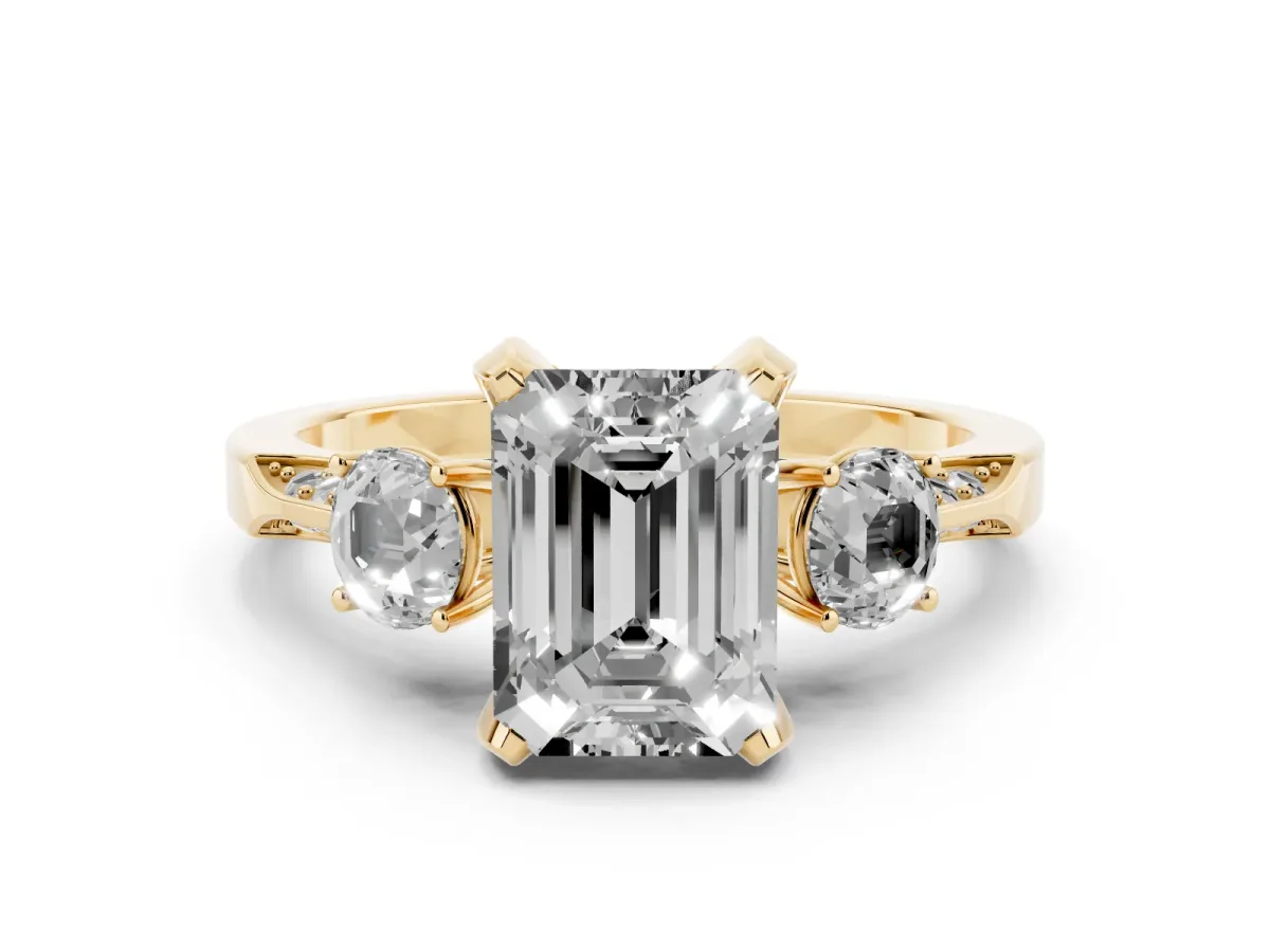 Fancy Blue Emerald Cut Diamond Three-Stone Ring Set in Yellow gold with Pavé Band and Smaller Side Stones