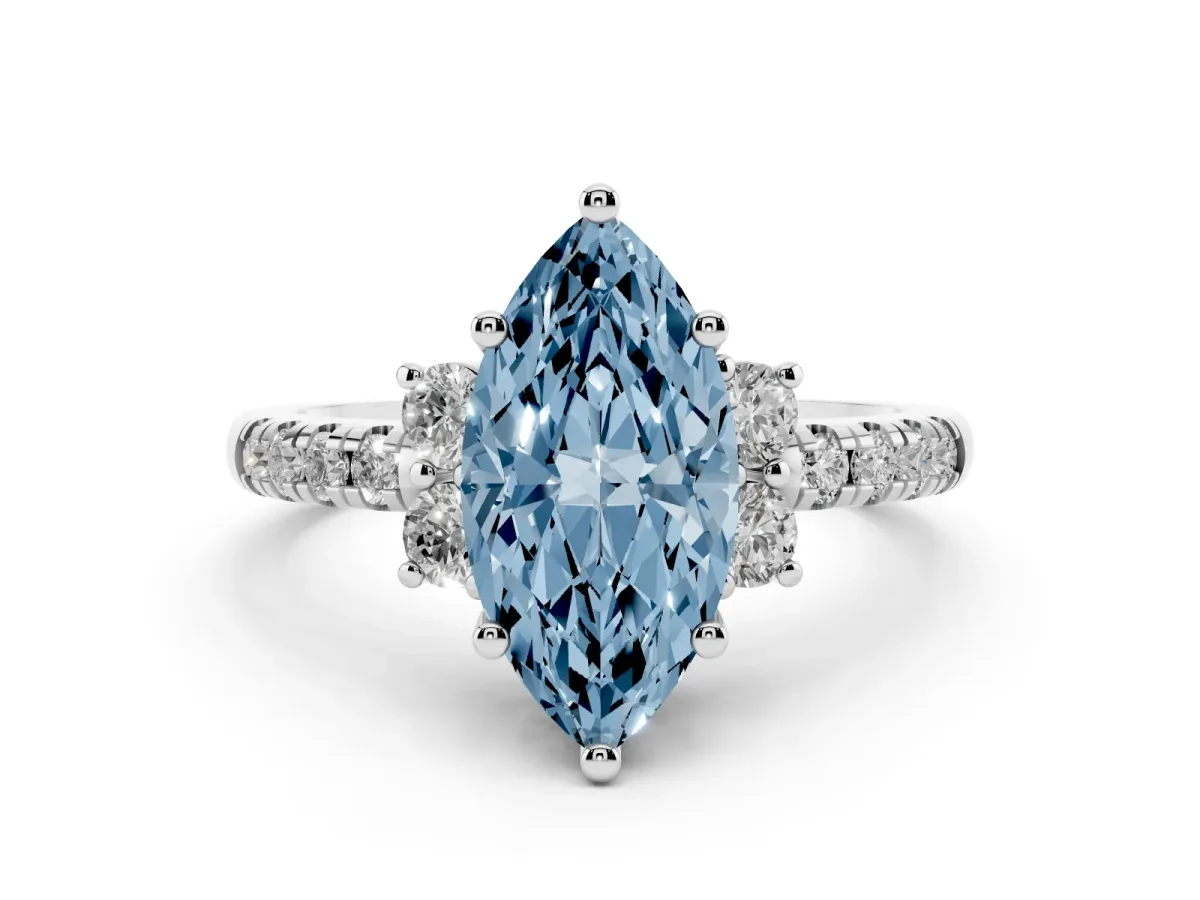 Fancy Blue Marquise Cut Diamond Three-Stone Pavé Ring Set in Platinum with Prong Setting