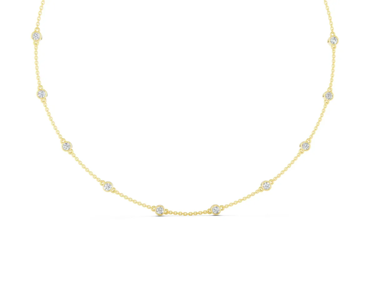 Round Diamond Station Necklace Set in Yellow gold with Bezel-Set Stones