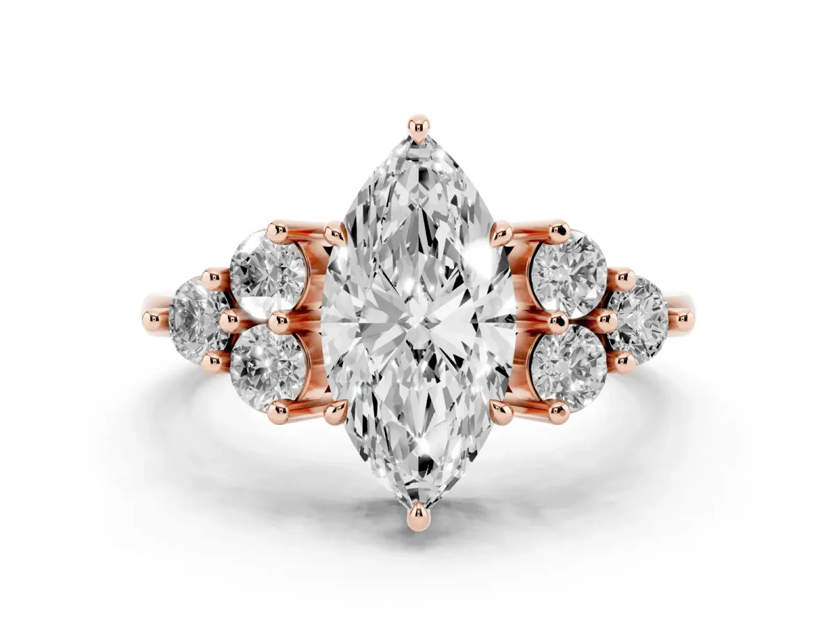 Marquise Cut Diamond Solitaire Ring Set in Rose gold with Cluster Accents on Each Side