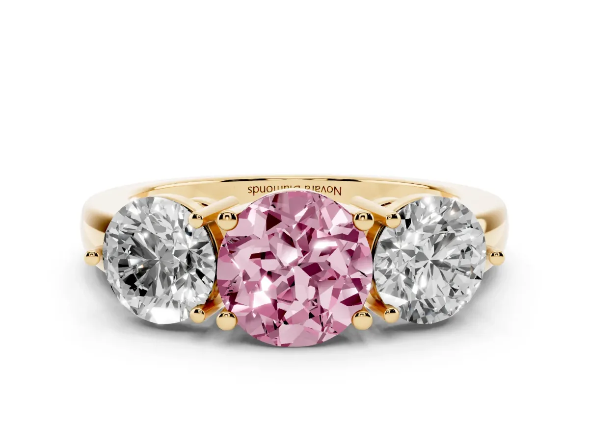 Fancy Pink Round Cut Diamond Three-Stone Ring Set in Yellow gold with Prong Setting and Plain Band