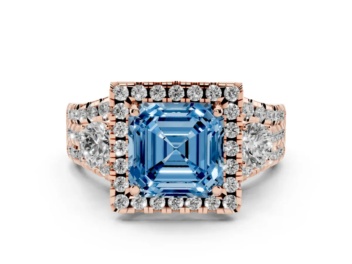 Fancy Blue Asscher Cut Diamond Halo Split Shank Ring Set in Rose gold with Round Accent Stones and Prong Setting