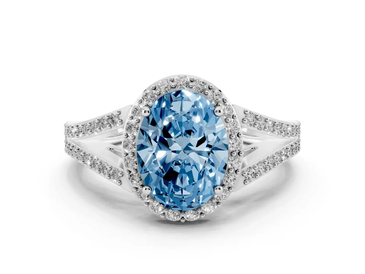 Fancy Blue Oval Cut Diamond Halo Split Shank Pavé Ring Set in Platinum with Prong Setting