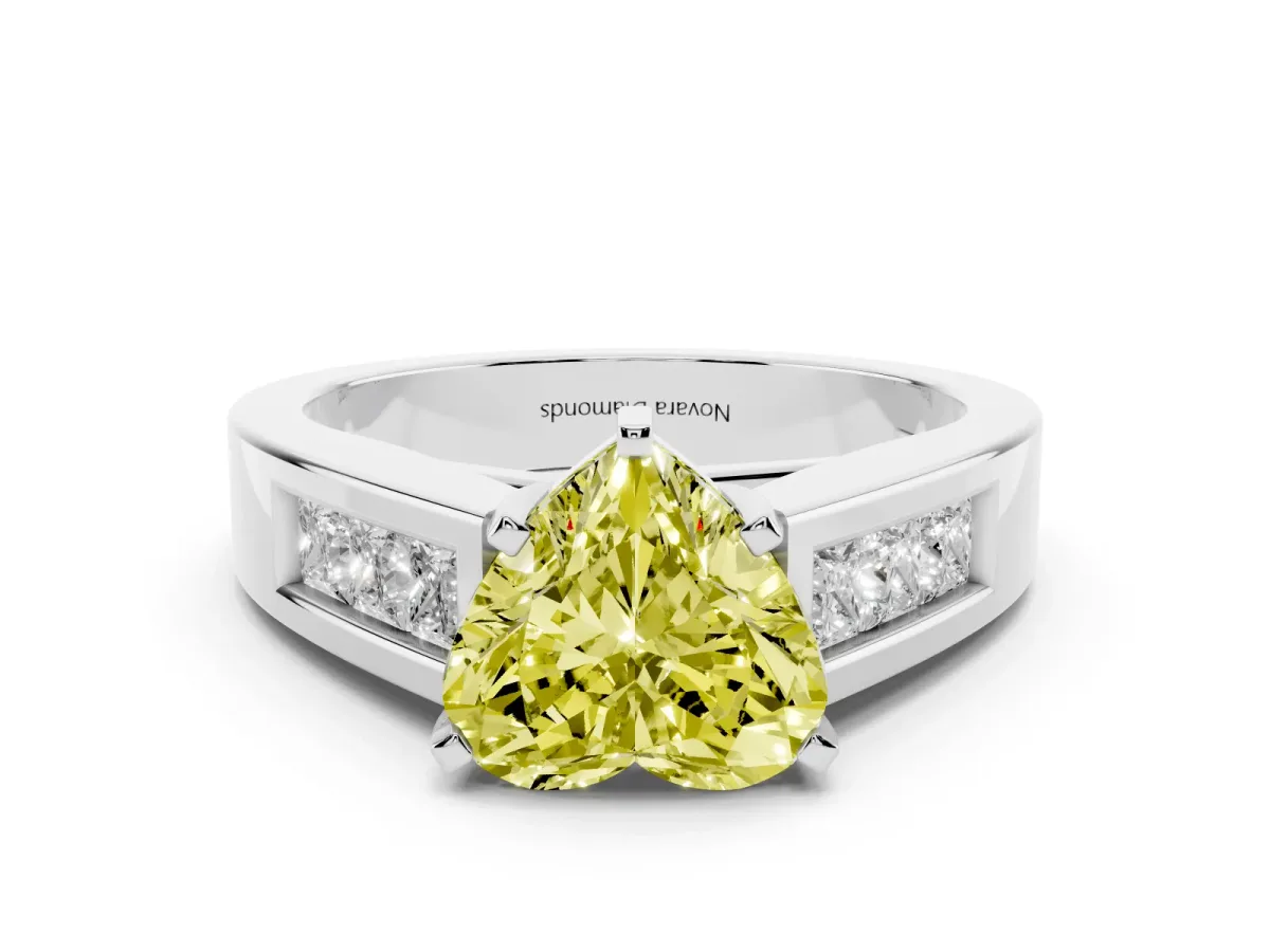 Fancy Yellow Heart Cut Diamond Solitaire Ring Set in White gold with Channel-Set Accent Stones and Prong Setting