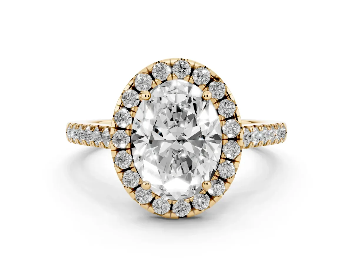 Oval Cut Diamond Pavé Halo Engagement Ring Set in Yellow gold with Pavé Band and Prong Setting
