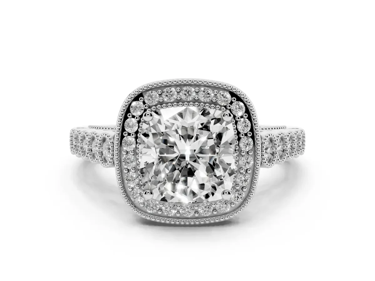Cushion Cut Diamond Milgrain Halo Solitaire Ring Set in Platinum with Bezel Set Side Stones and Pavé Band