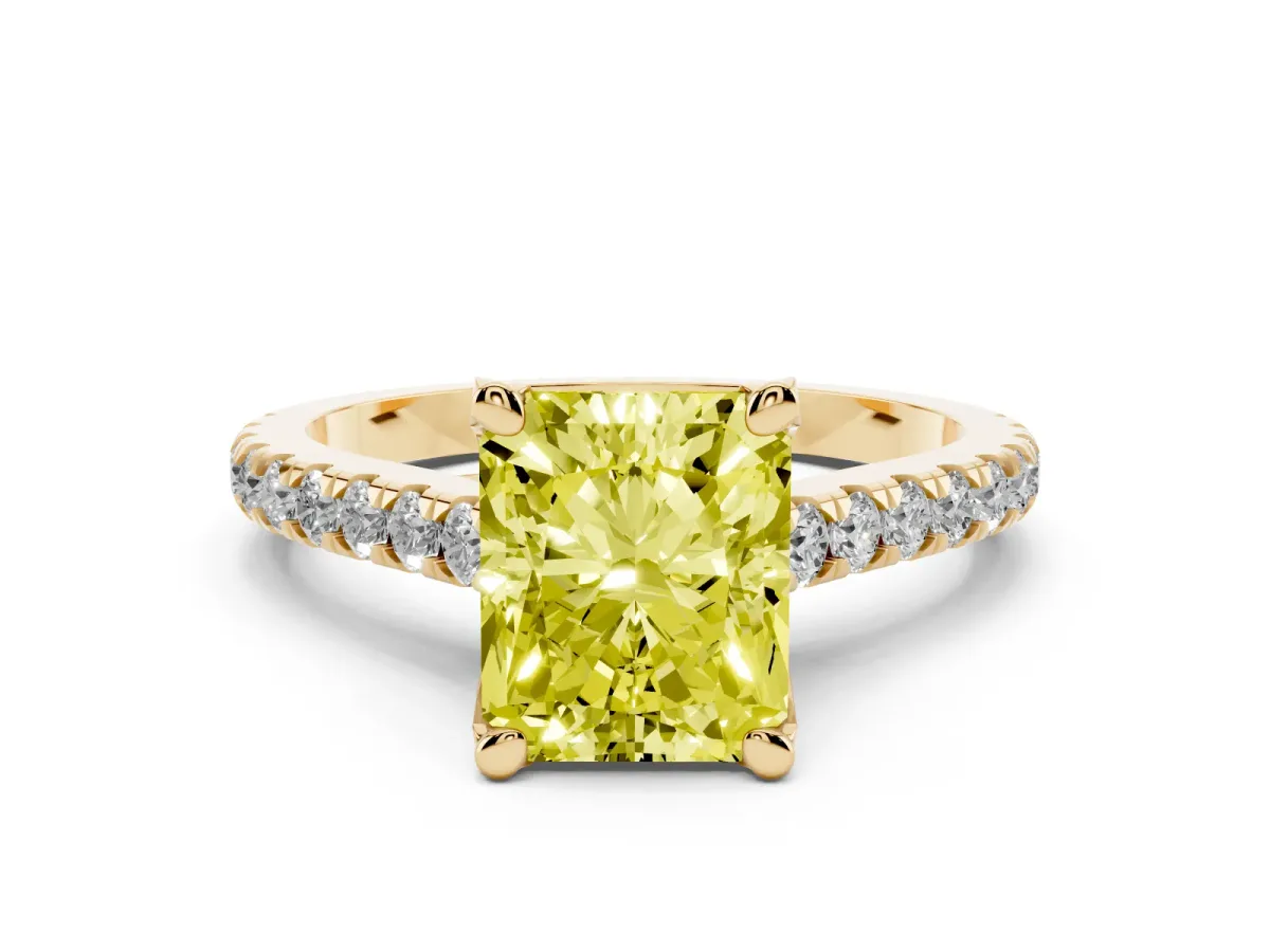 Fancy Yellow Radiant Cut Diamond Solitaire Ring Set in Yellow gold with Brilliant Pavé Band and Prong Setting