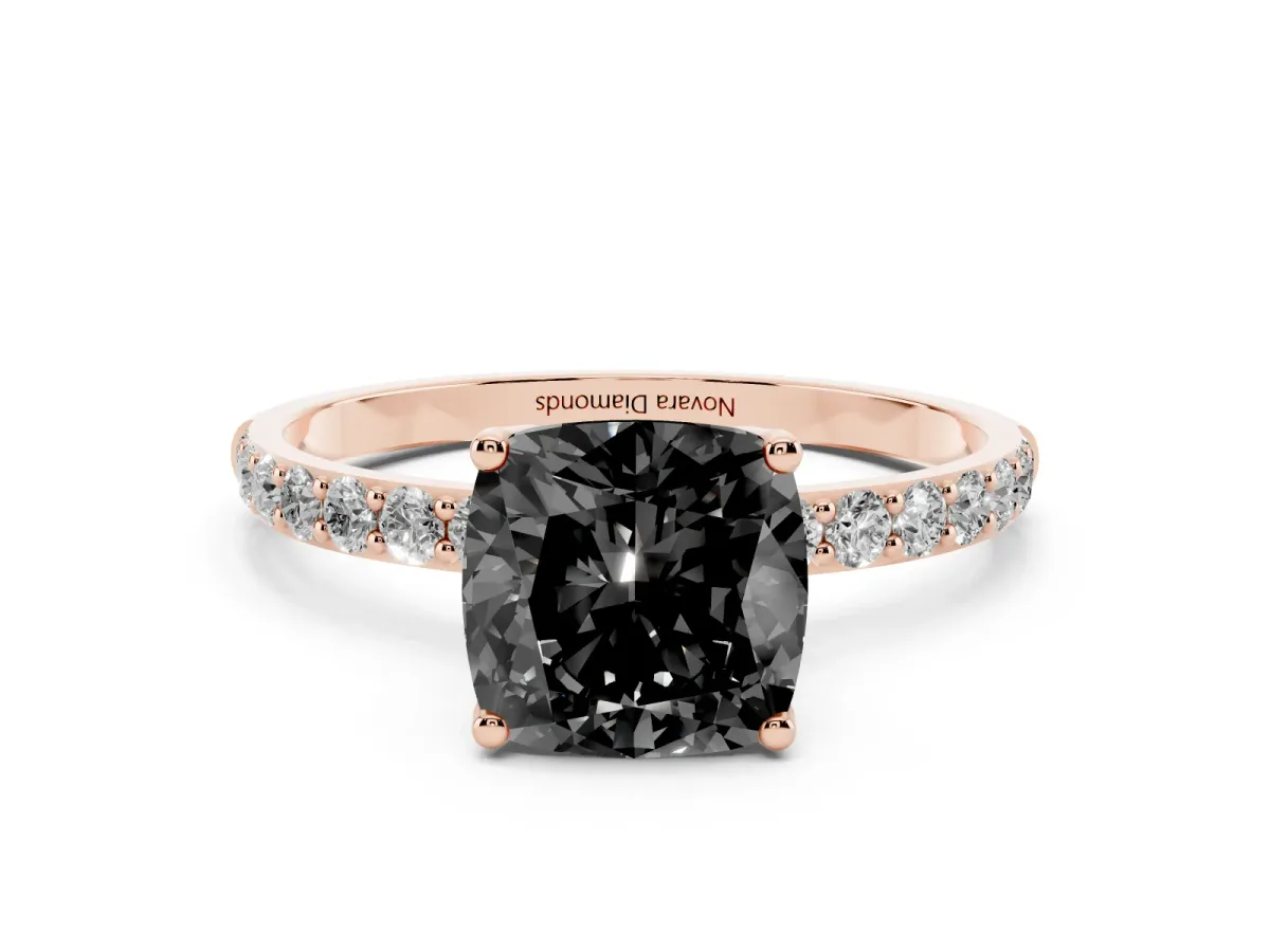 Fancy Black Cushion Cut Diamond Solitaire Engagement Ring Set in Rose gold with Round Pavé Band and Prong Setting