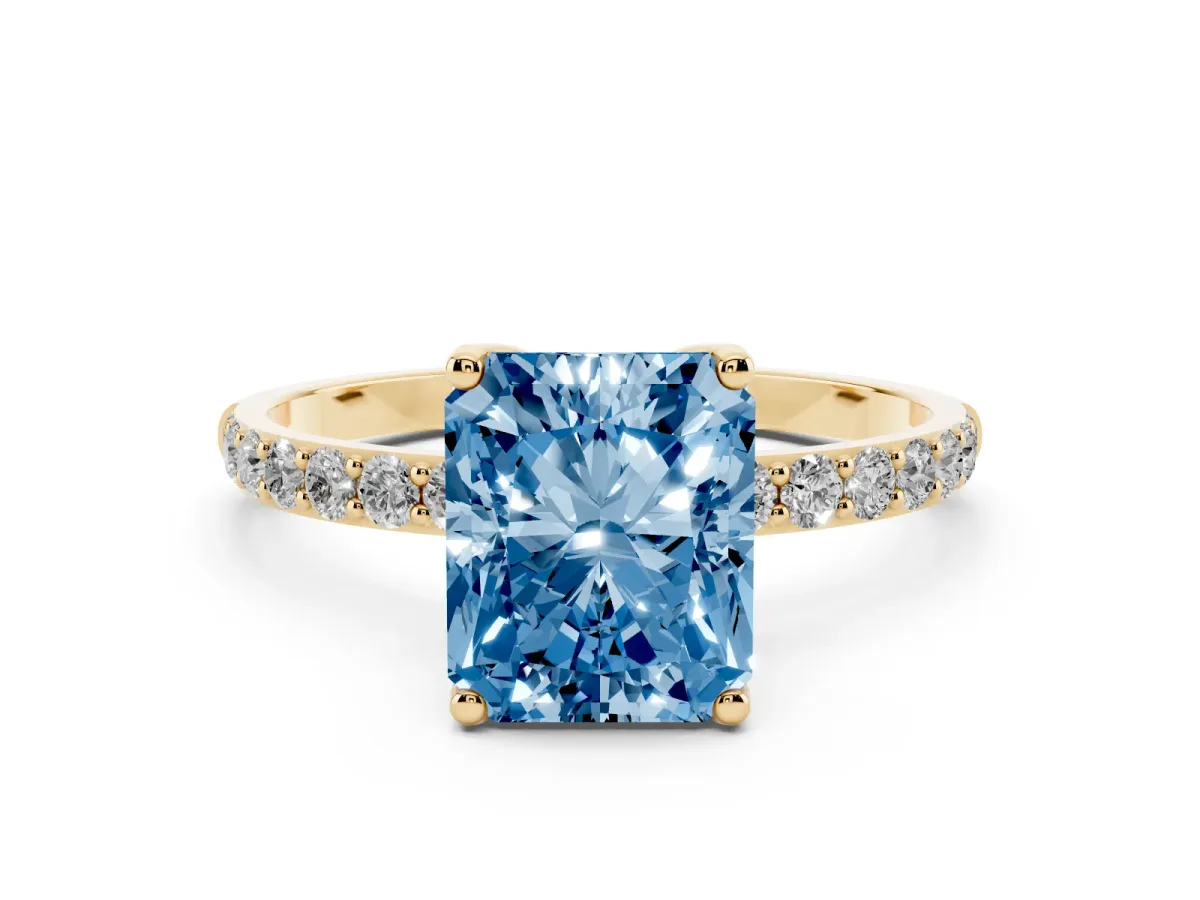 Fancy Blue Radiant Cut Diamond Solitaire Engagement Ring Set in Yellow gold with Round Pavé Band and Prong Setting