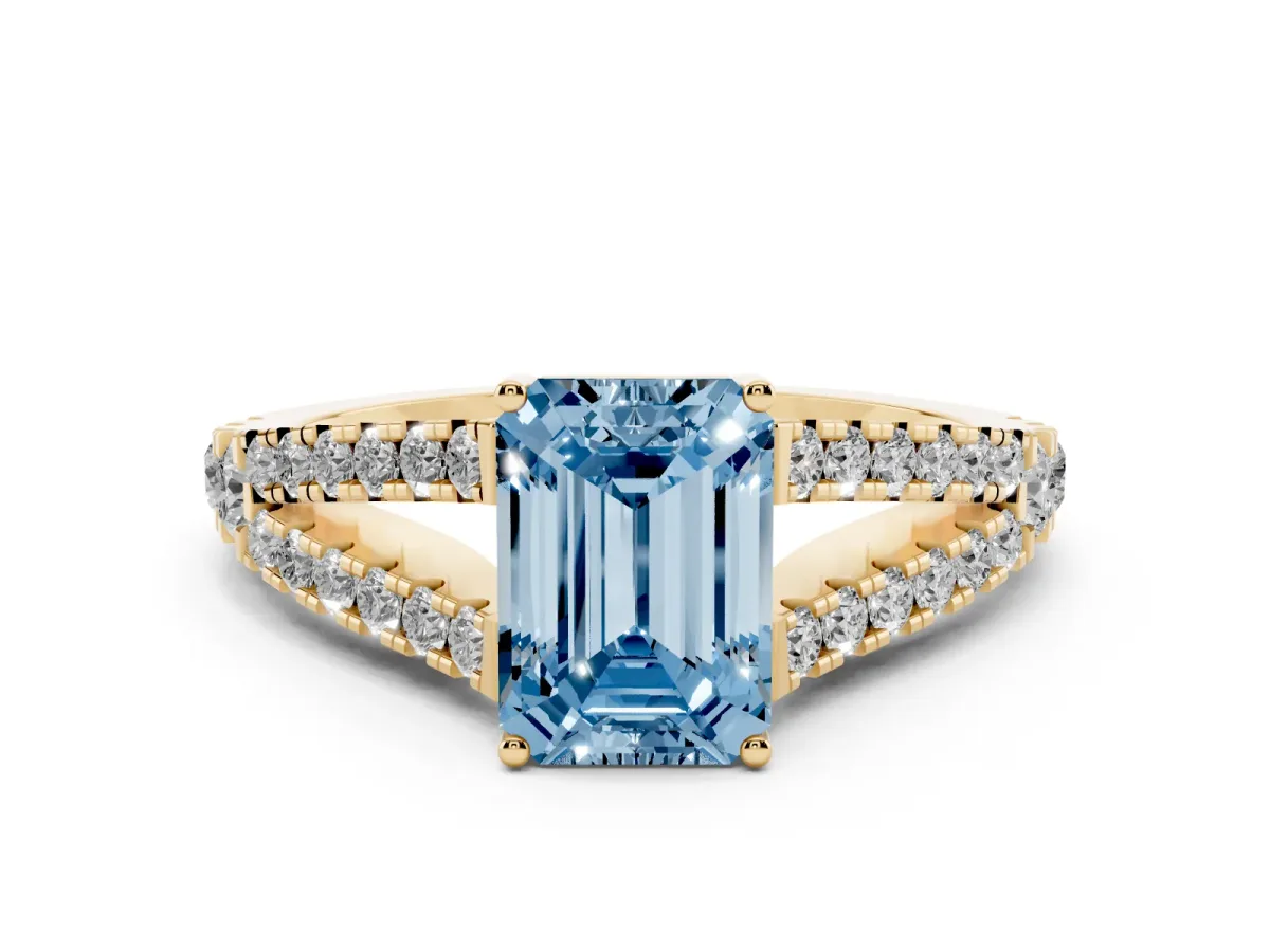 Fancy Blue Emerald Cut Diamond Split Shank Pavé Engagement Ring Set in Yellow gold with Prong-Held Center Stone