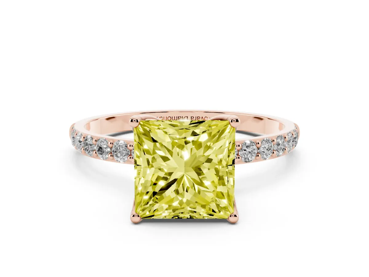 Fancy Yellow Princess Cut Diamond Solitaire Engagement Ring Set in Rose gold with Round Pavé Band and Prong Setting