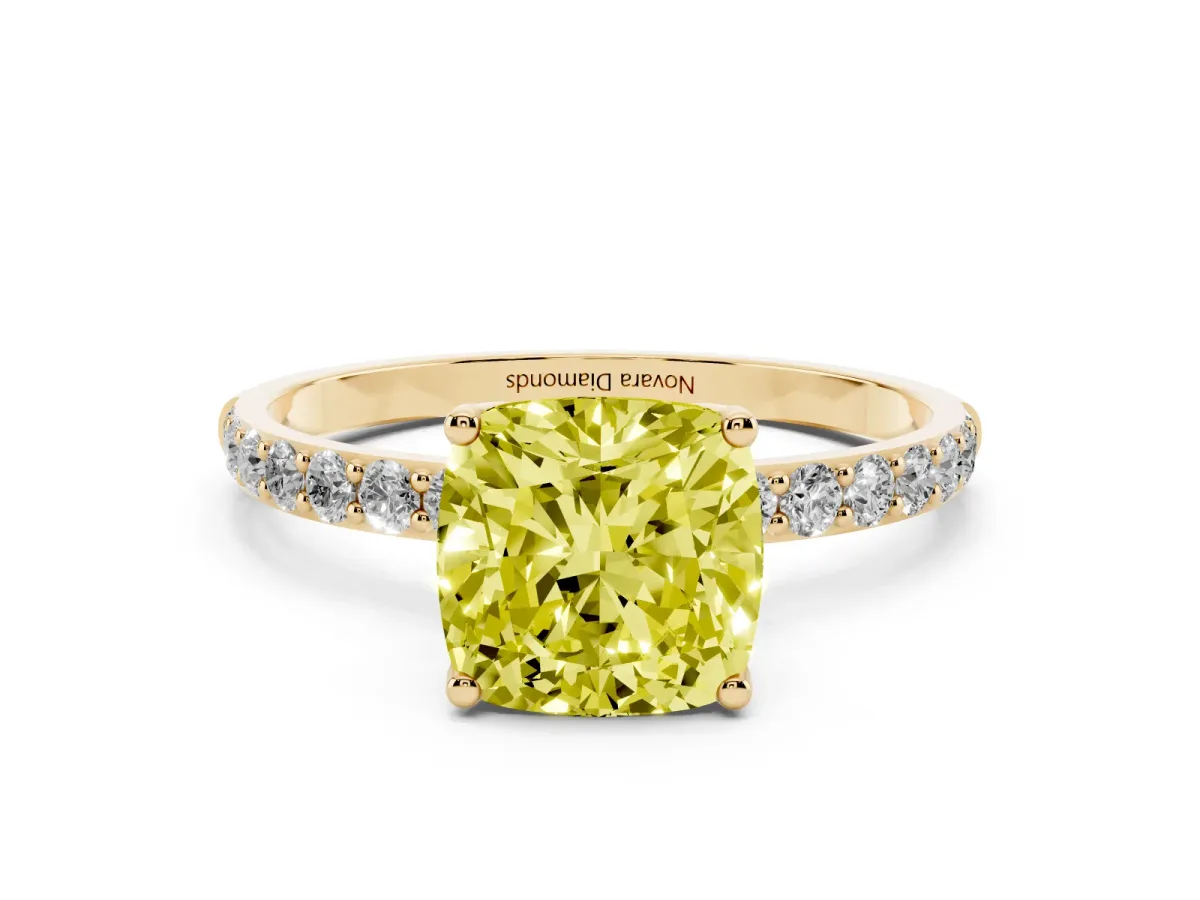 Fancy Yellow Cushion Cut Diamond Solitaire Engagement Ring Set in Yellow gold with Round Pavé Band and Prong Setting