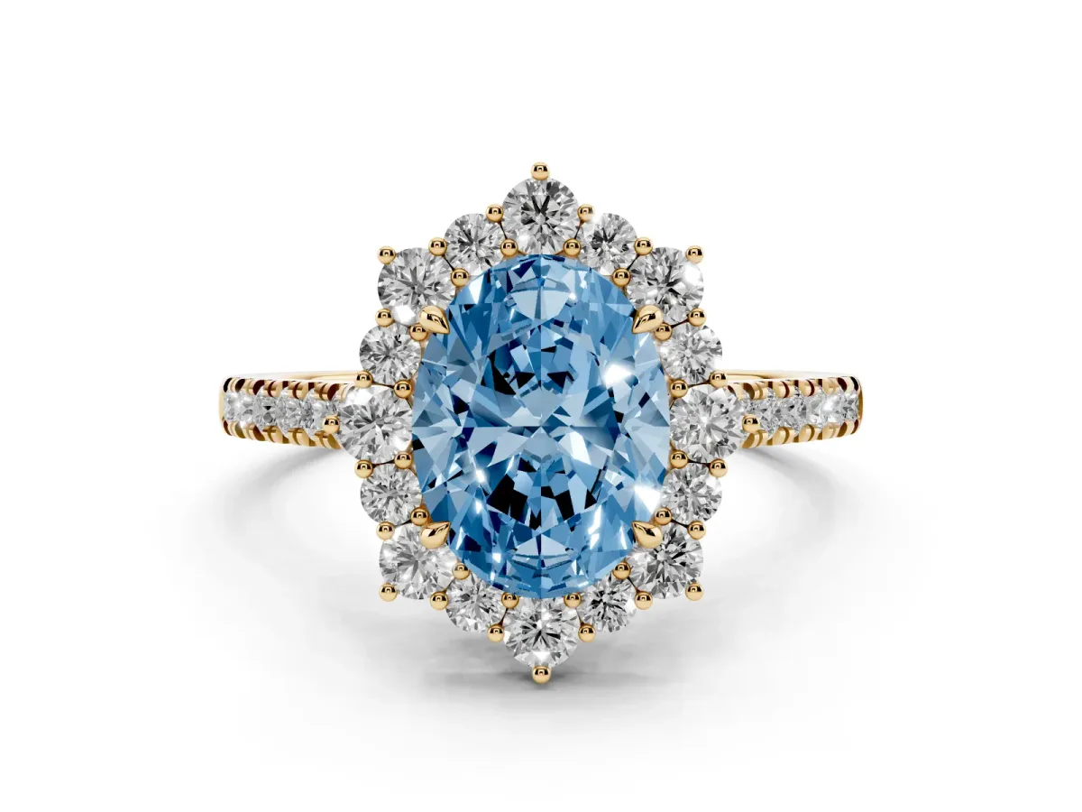 Fancy Blue Oval Cut Diamond Halo Ring Set in Yellow gold with Pavé Band and Prong Setting