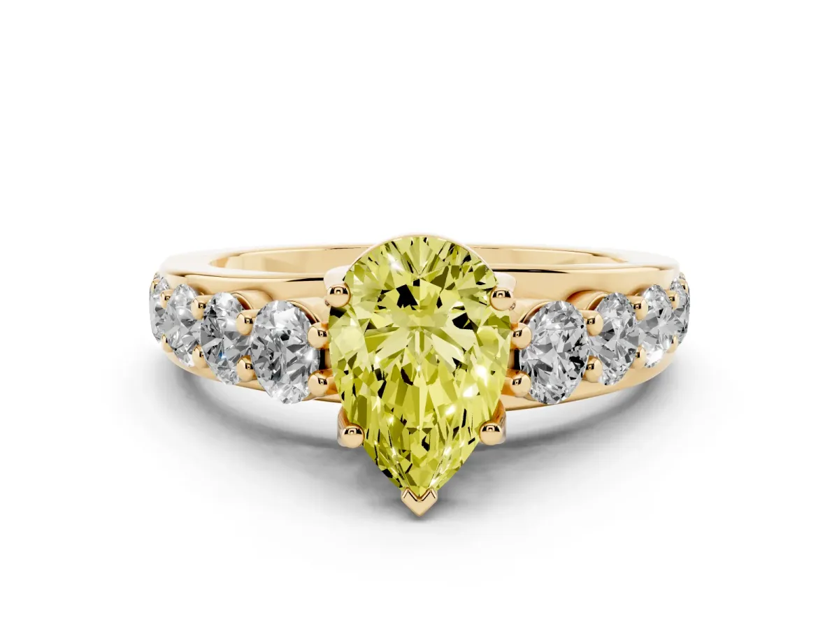 Fancy Yellow Pear Cut Diamond Pavé Engagement Ring Set in Yellow gold with Prong Setting