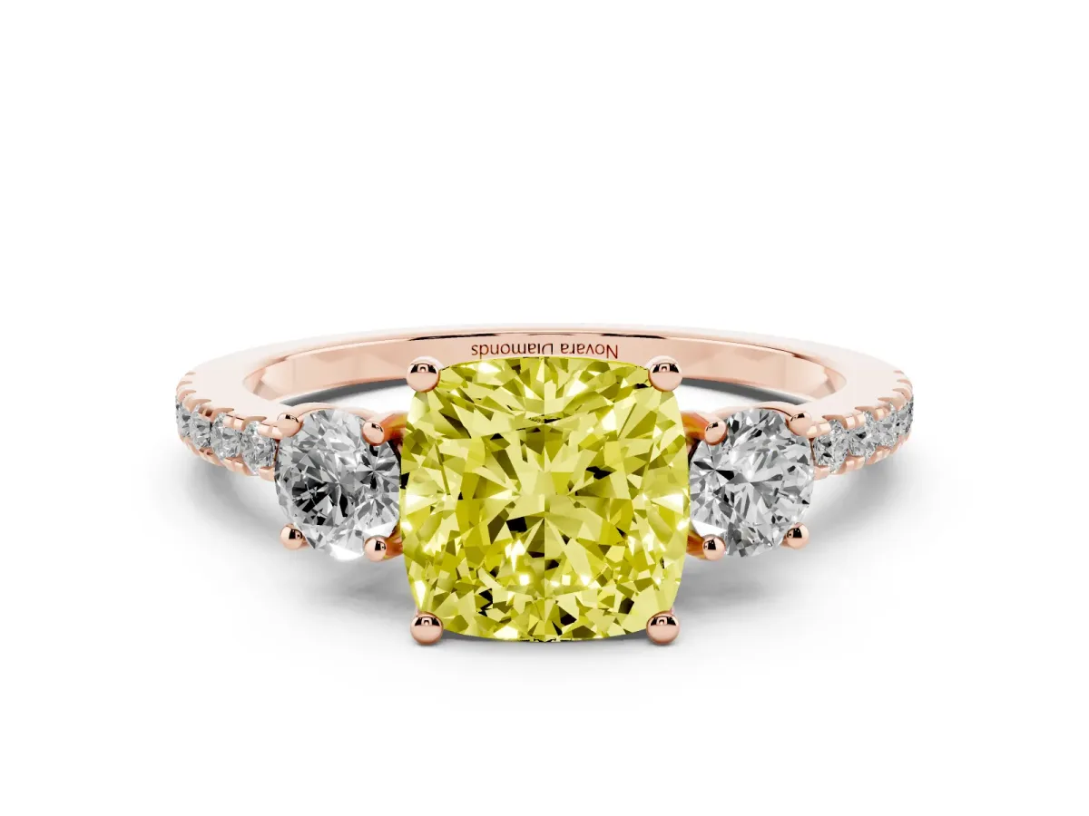 Fancy Yellow Cushion Cut Diamond Three-Stone Ring Set in Rose gold with Pavé Band and Graduated Sides