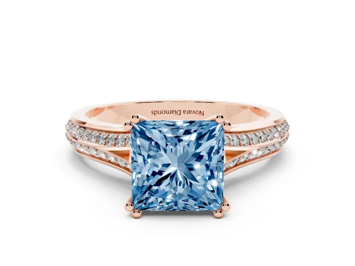 Fancy Blue Princess Cut Diamond Split Shank Pavé Engagement Ring Set in Rose gold with Prong-Set Center Stone