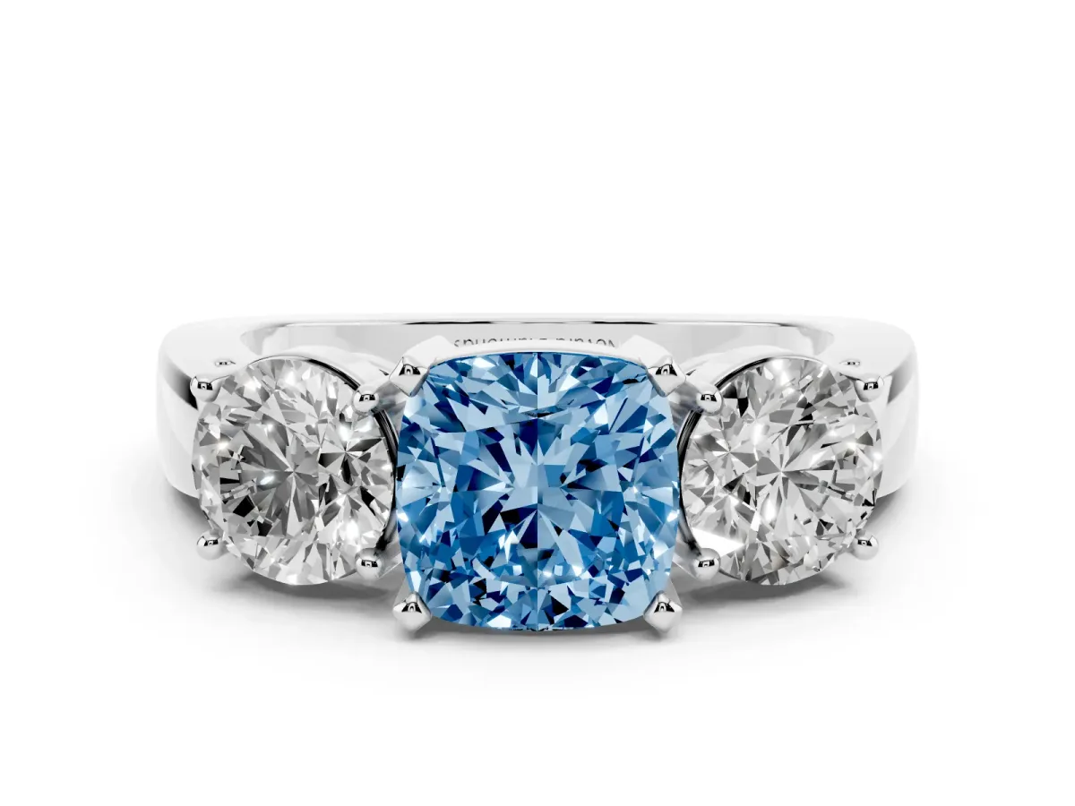 Fancy Blue Cushion Cut Diamond Three-Stone Ring Set in Platinum with Round Side Stones and Classic Band