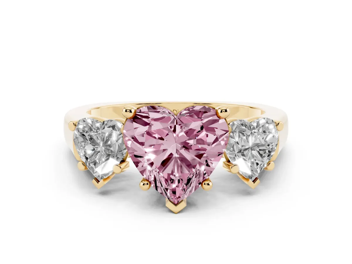 Fancy Pink Heart Cut Diamond Three-Stone Trellis Ring Set in Yellow gold with Comfort Fit Band