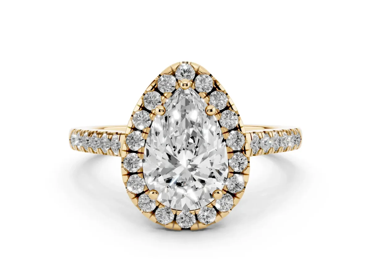 Pear Cut Diamond Pavé Halo Engagement Ring Set in Yellow gold with Pavé Band and Prong Setting