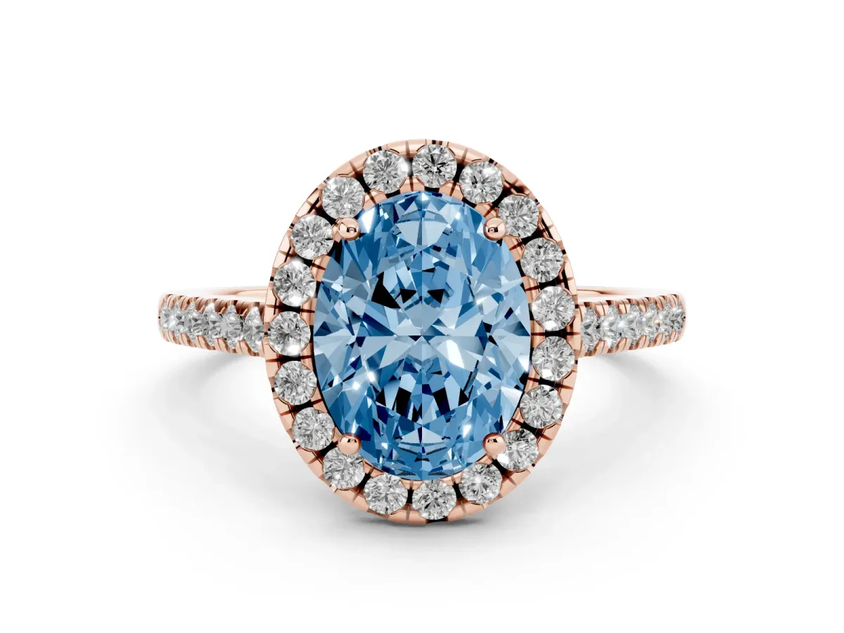 Fancy Blue Oval Cut Diamond Pavé Halo Engagement Ring Set in Rose gold with Pavé Band and Prong Setting