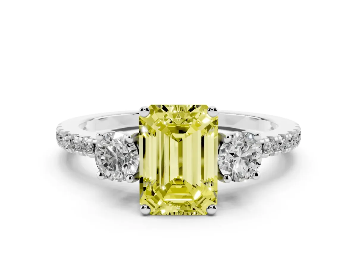 Fancy Yellow Emerald Cut Diamond Three-Stone Ring Set in Platinum with Pavé Band and Graduated Sides