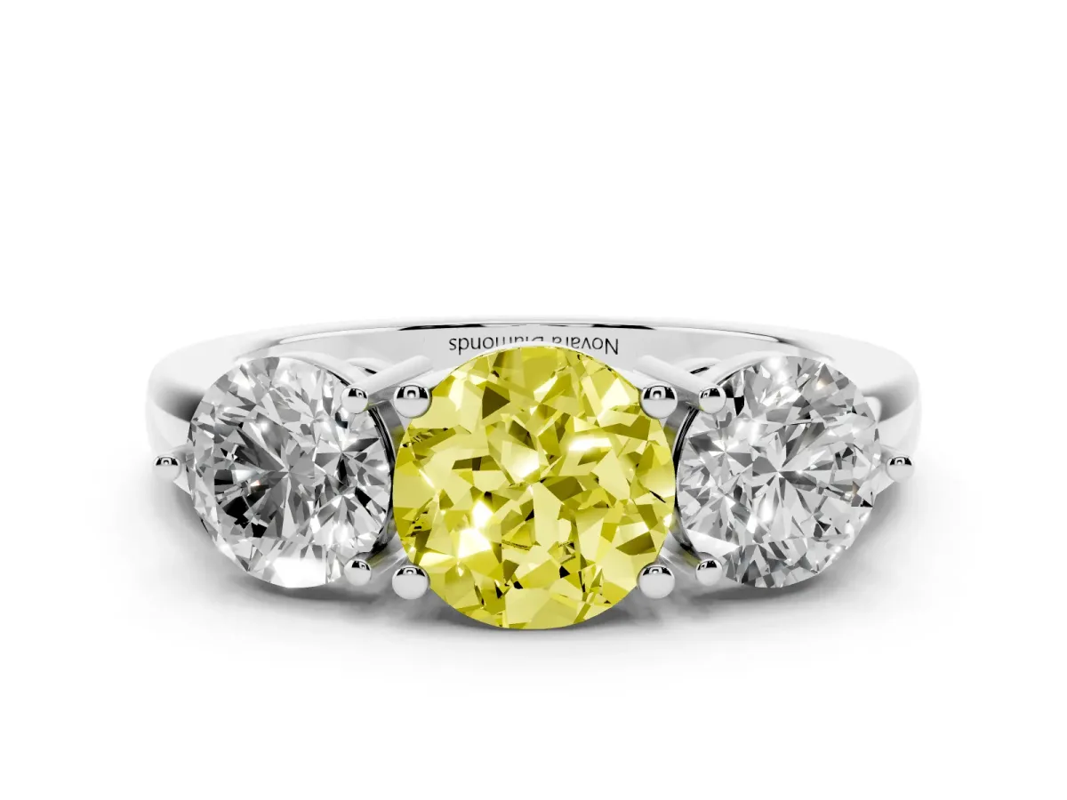 Fancy Yellow Round Cut Diamond Three-Stone Ring Set in Platinum with Prong Setting and Plain Band