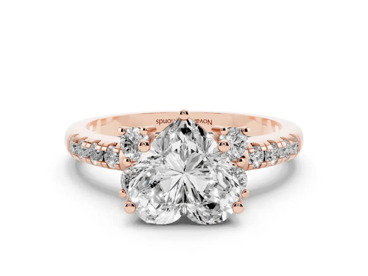 Heart Cut Diamond Three-Stone Pavé Ring Set in Rose gold with Prong Setting