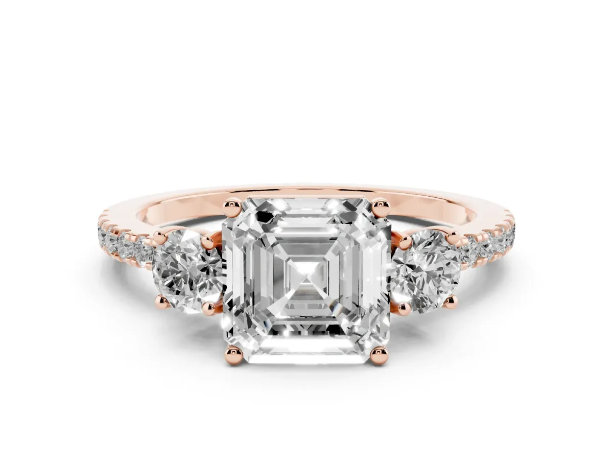 Asscher Cut Diamond Three-Stone Ring Set in Rose gold with Pavé Band and Graduated Sides