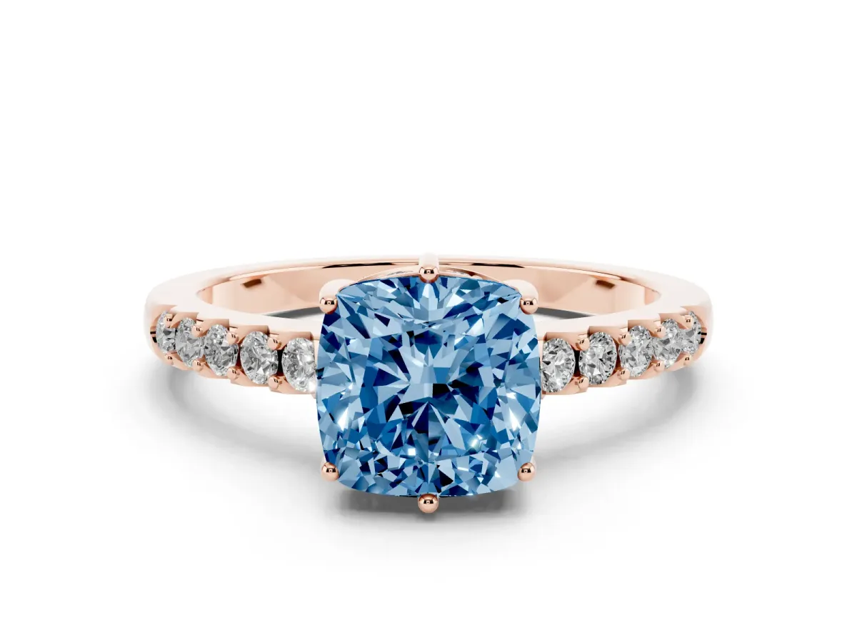 Fancy Blue Cushion Cut Diamond Solitaire Engagement Ring Set in Rose gold with Pavé Band and Prong Setting