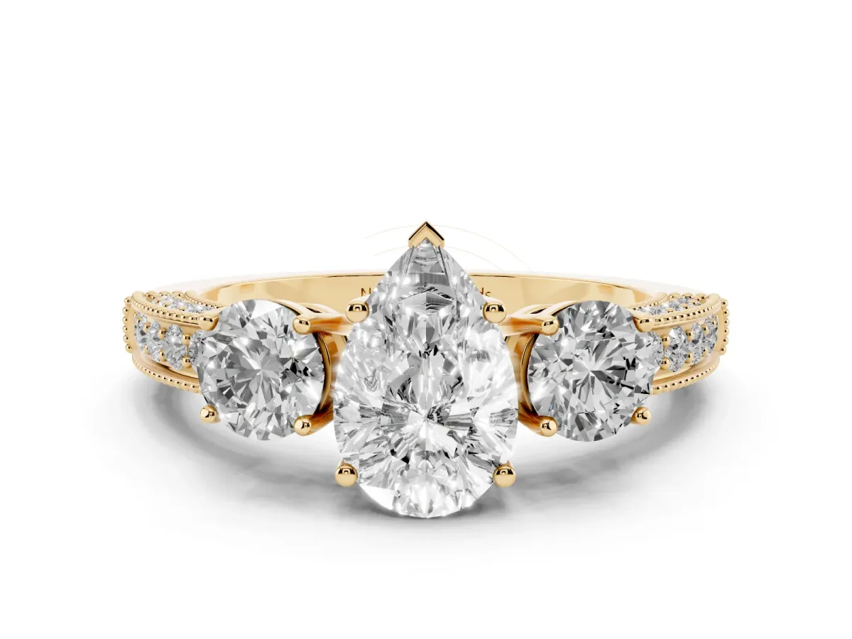 Pear Cut Diamond Three-Stone Ring Set in Yellow gold with Round Side Stones and Pavé Band