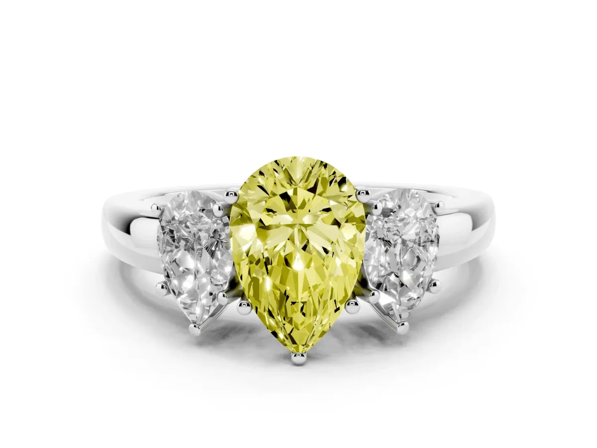 Fancy Yellow Pear Cut Diamond Three-Stone Ring Set in White gold with Bold Center and Classic Band