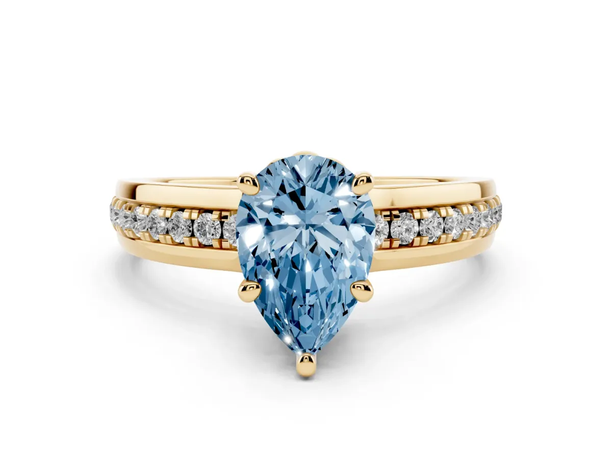 Fancy Blue Pear Cut Diamond Solitaire Ring Set in Yellow gold with Channel Set Band and Prong Setting