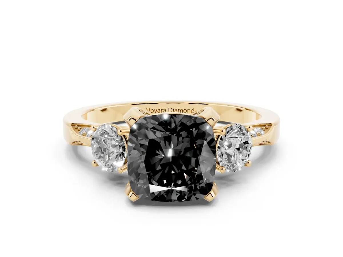 Fancy Black Cushion Cut Diamond Three-Stone Ring Set in Yellow gold with Pavé Band and Smaller Side Stones