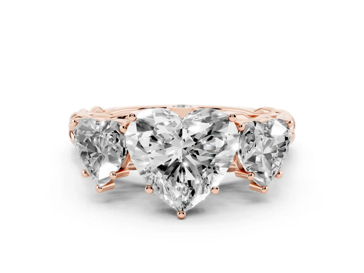 Heart Cut Diamond Three-Stone Ring Set in Rose gold with Braided Band