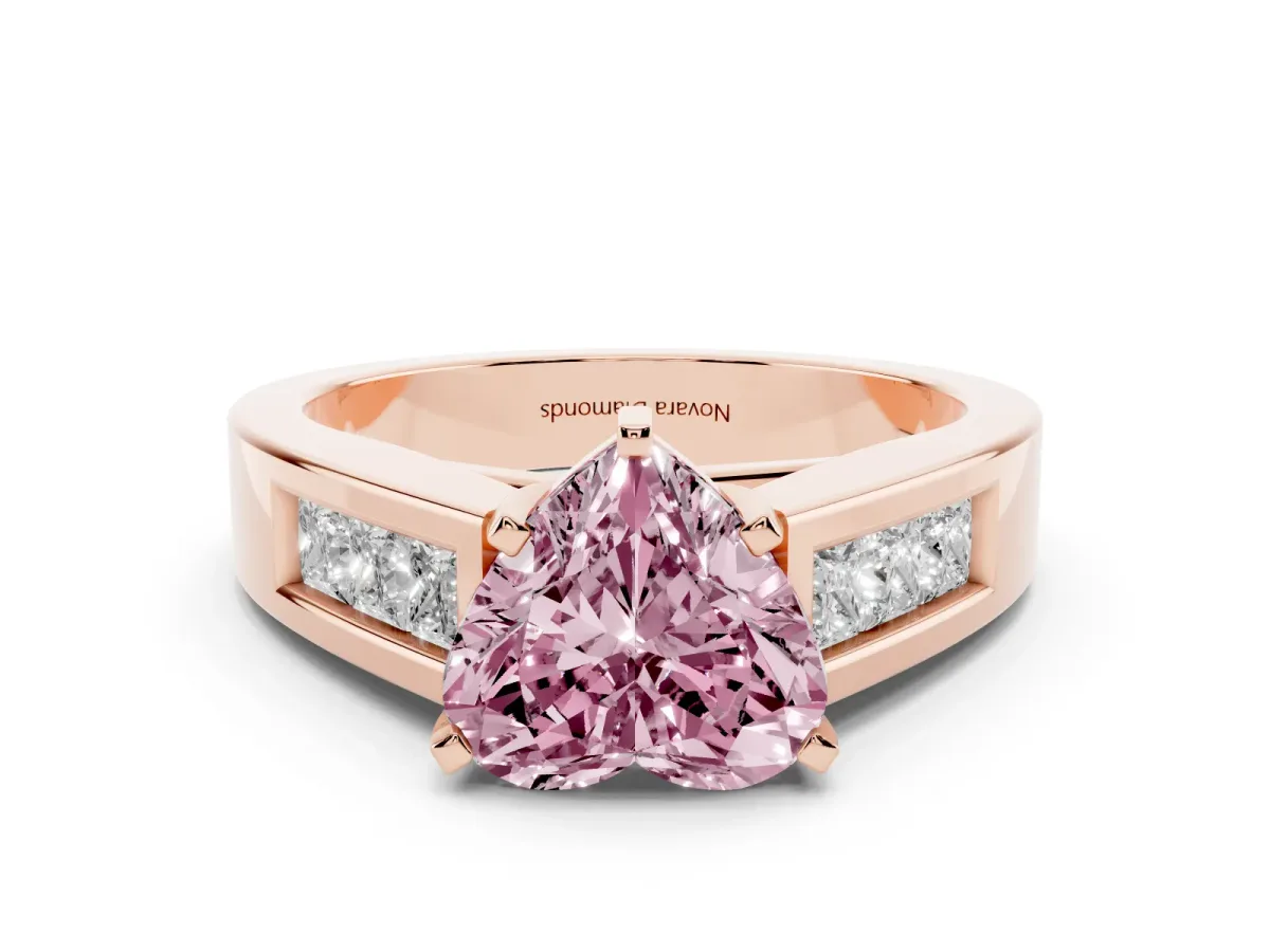 Fancy Pink Heart Cut Diamond Solitaire Ring Set in Rose gold with Channel-Set Accent Stones and Prong Setting