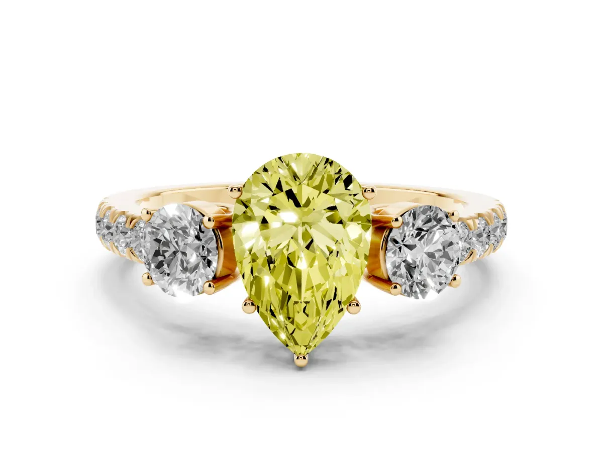 Fancy Yellow Pear Cut Diamond Three-Stone Ring Set in Yellow gold with Round Side Stones and Delicate Pavé Band