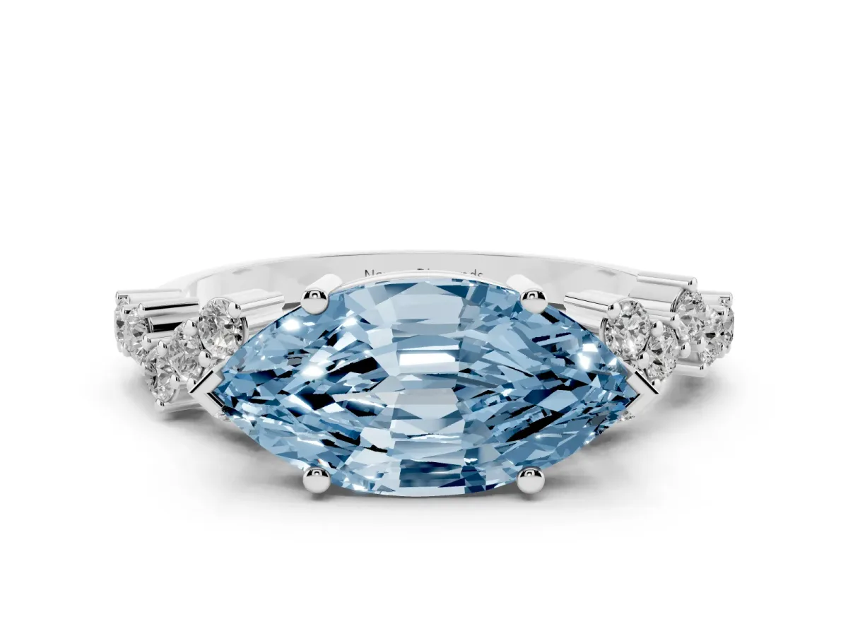 Fancy Blue Marquise Cut Diamond Ring Set in Platinum with Scattered Round Accents