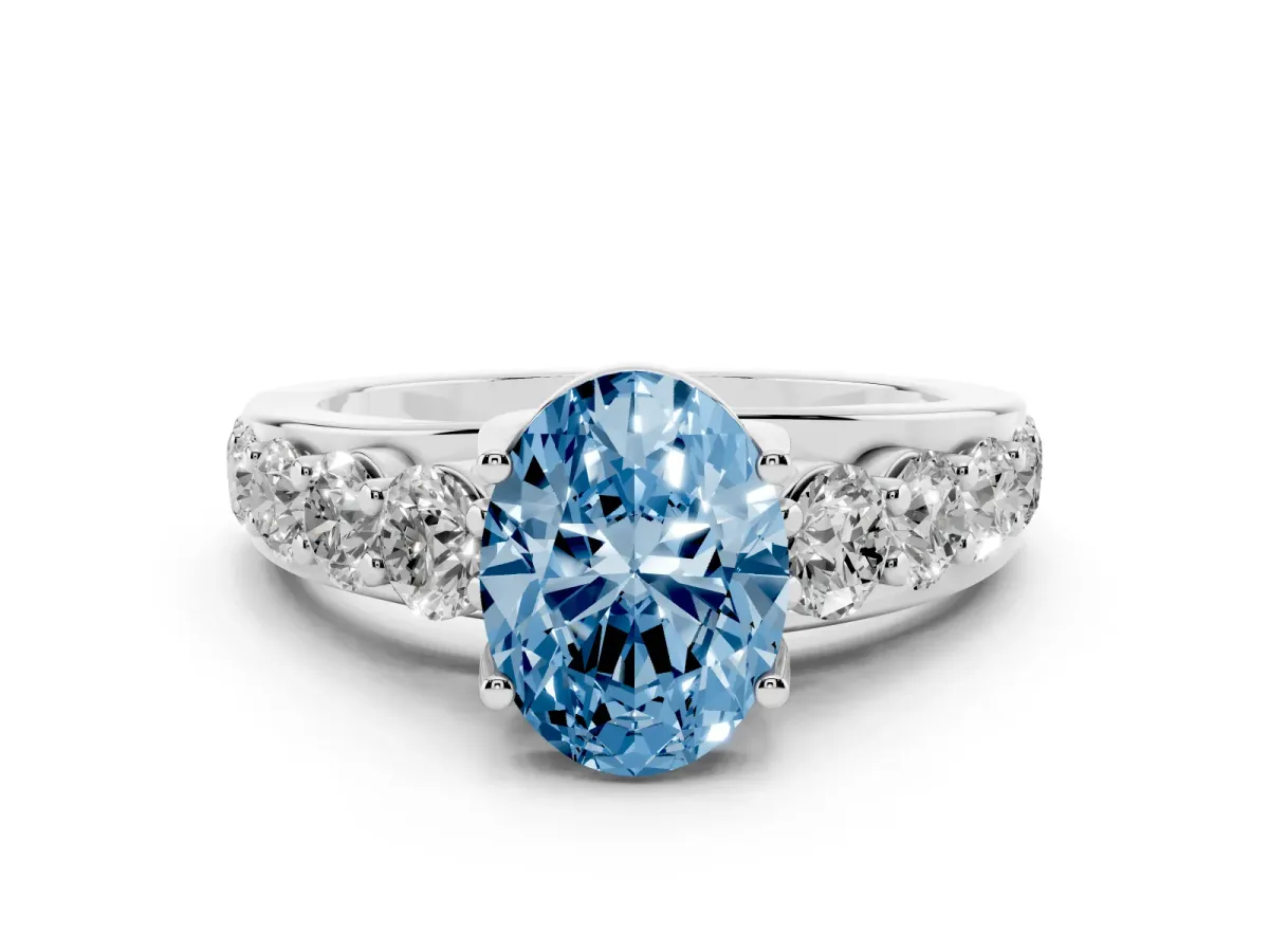 Fancy Blue Oval Cut Diamond Pavé Engagement Ring Set in Platinum with Prong Setting