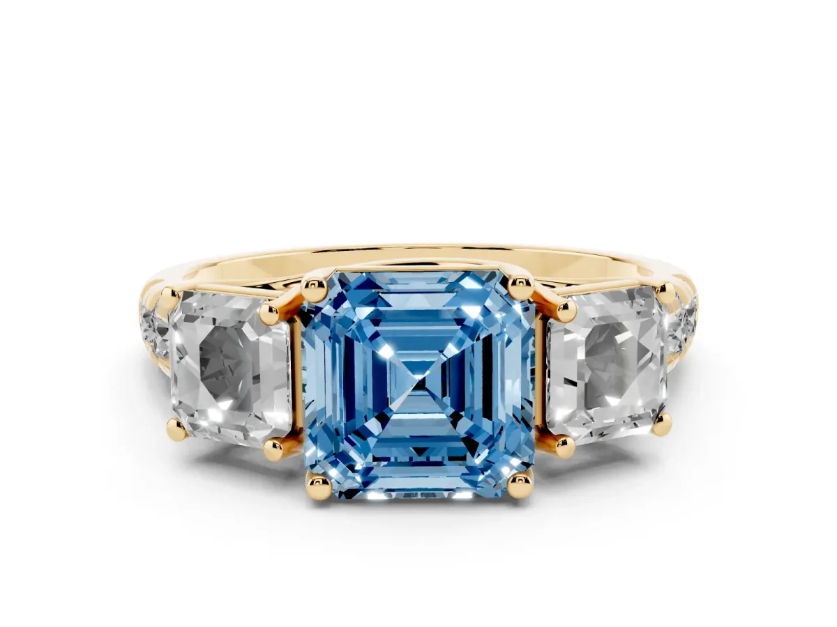Fancy Blue Asscher Cut Diamond Three-Stone Ring Set in Yellow gold with Pavé Band