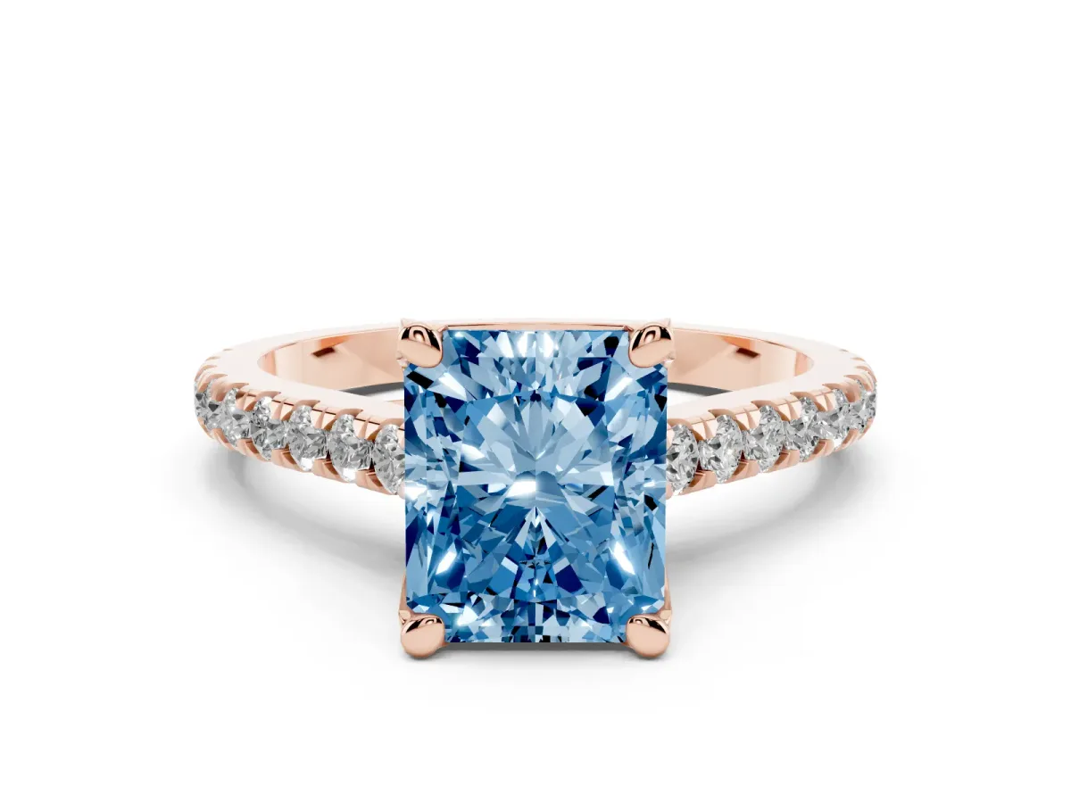 Fancy Blue Radiant Cut Diamond Solitaire Ring Set in Rose gold with Brilliant Pavé Band and Prong Setting