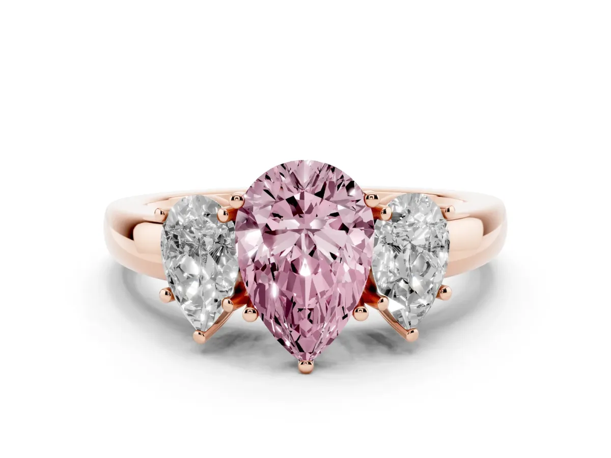 Fancy Pink Pear Cut Diamond Three-Stone Ring Set in Rose gold with Bold Center and Classic Band
