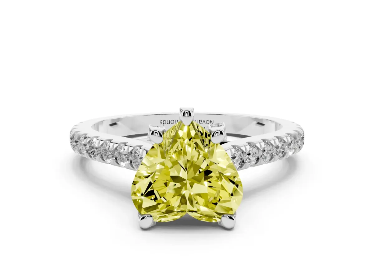 Fancy Yellow Heart Cut Diamond Solitaire Ring Set in Platinum with Brilliant Pavé Band and Prong Setting