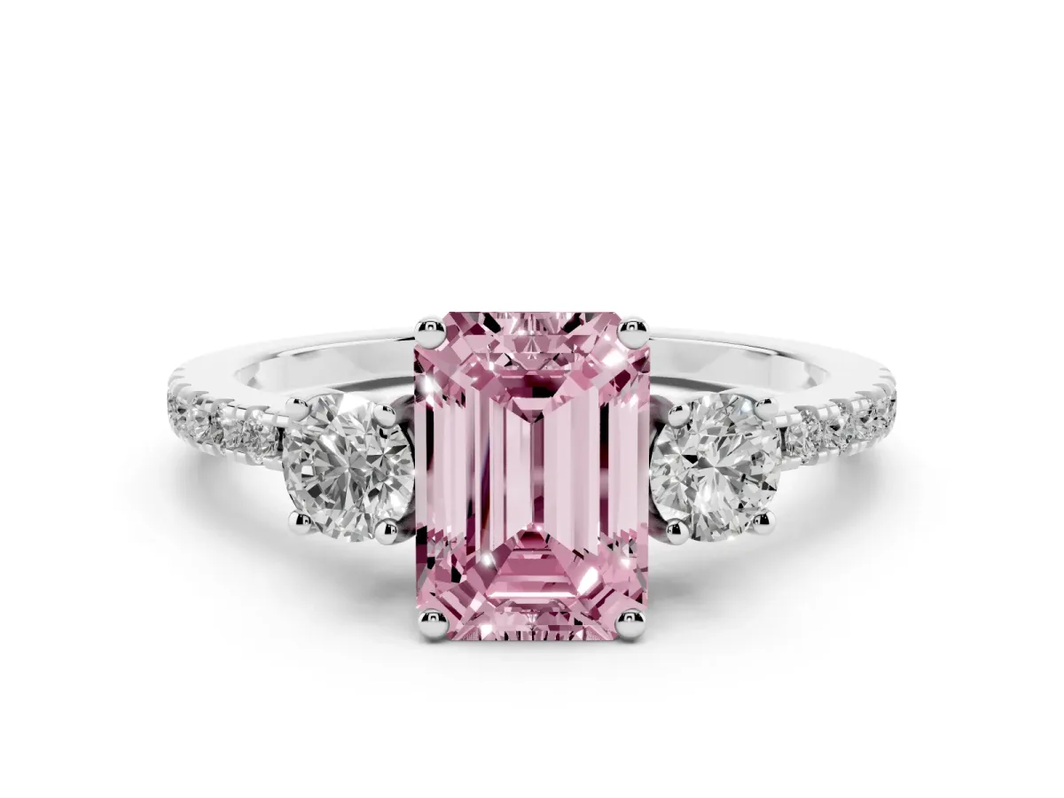 Fancy Pink Emerald Cut Diamond Three-Stone Ring Set in Platinum with Pavé Band and Graduated Sides