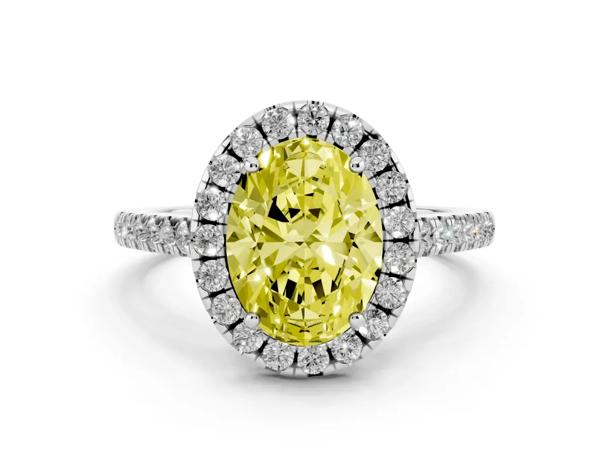 Fancy Yellow Oval Cut Diamond Pavé Halo Engagement Ring Set in White gold with Pavé Band and Prong Setting