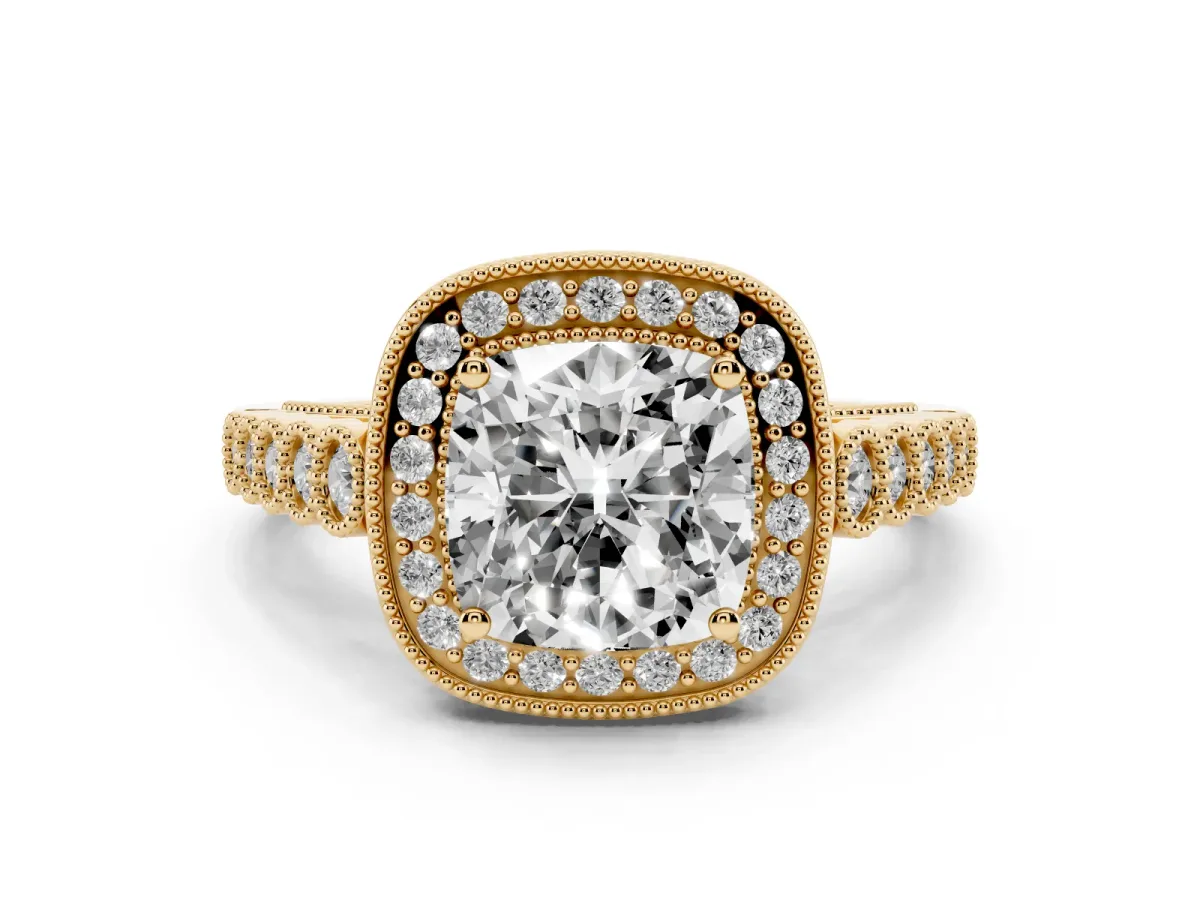 Cushion Cut Diamond Milgrain Halo Solitaire Ring Set in Yellow gold with Bezel Set Side Stones and Pavé Band