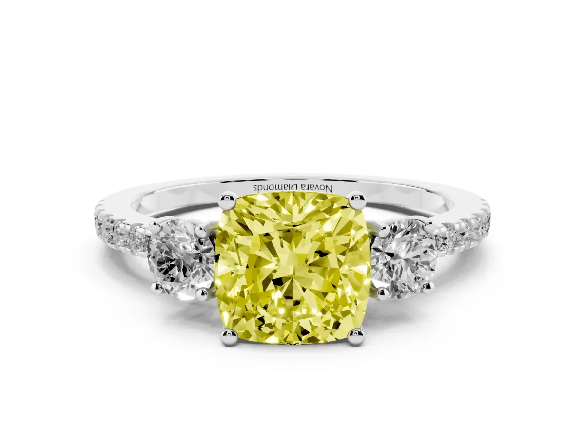 Fancy Yellow Cushion Cut Diamond Three-Stone Ring Set in Silver with Pavé Band and Graduated Sides
